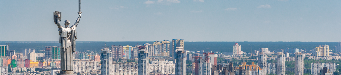 Kyiv Motherland Monument and skyline panorama
